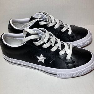 Brand New Black & White leather Converses.